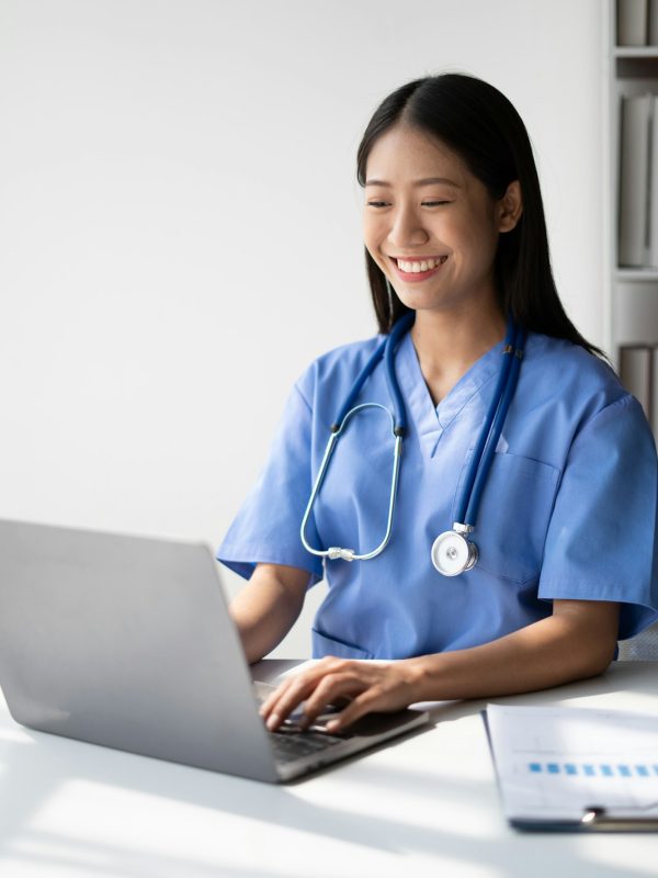 Female doctor consulting patient online from clinic office. Giving medical prescriptions by internet